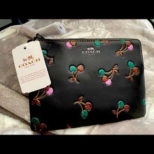 New Coach Corner Zip Wristlet. Black Cherry